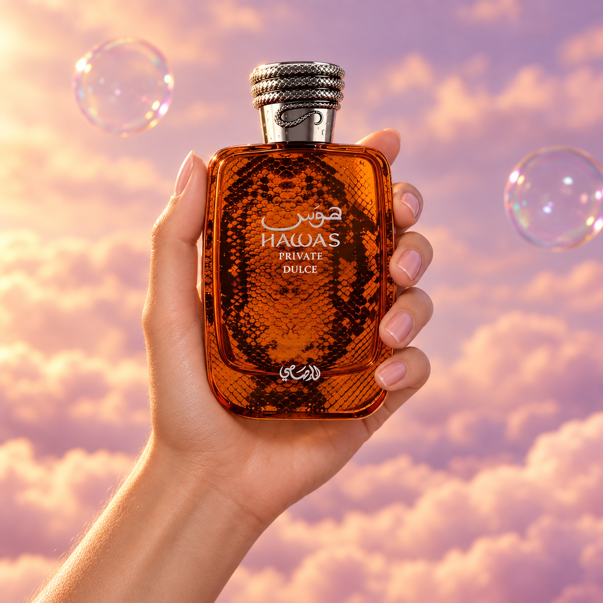 A hand holds the bottle of Hawas Private Dulce by Rasasi among pink clouds.