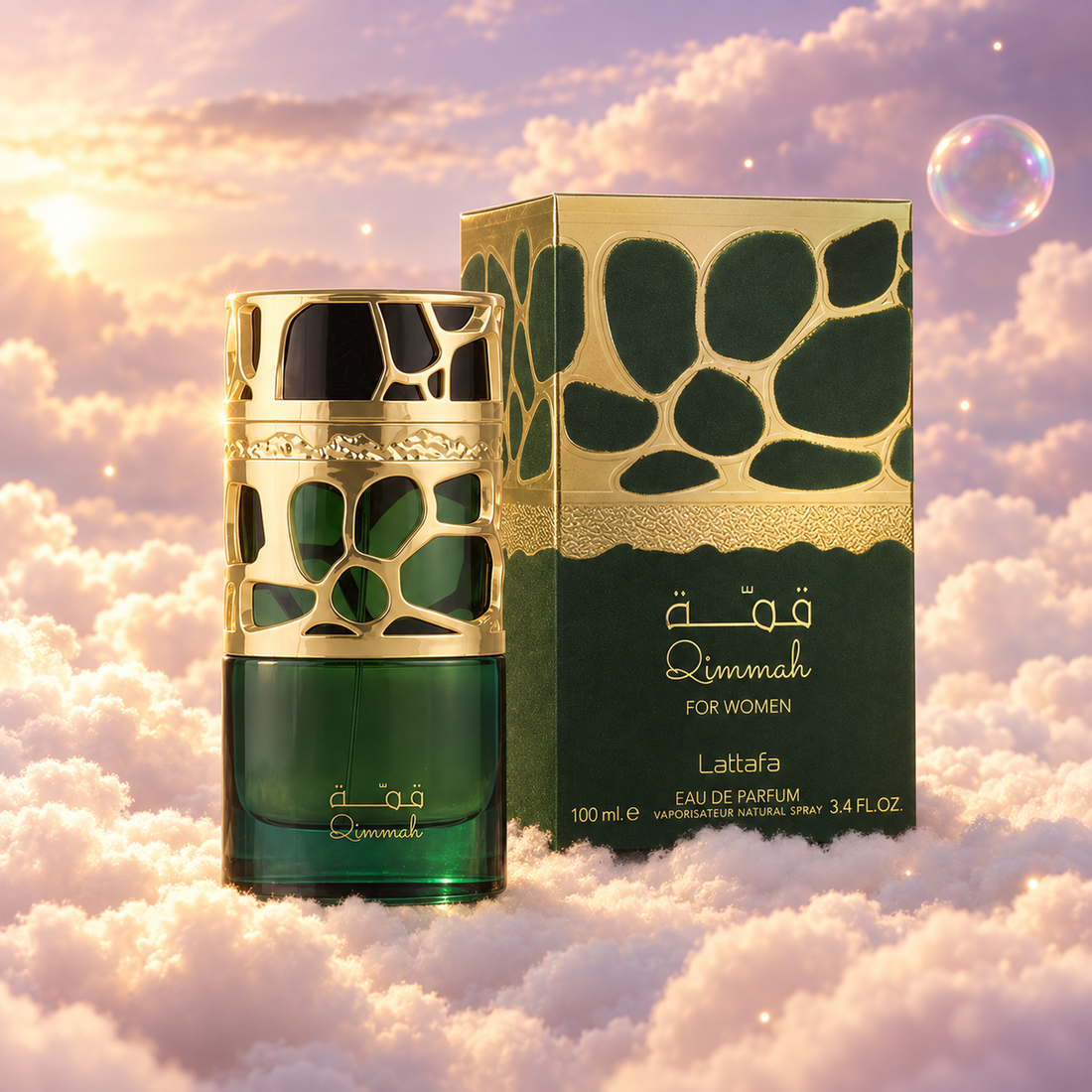 The bottle of Qimmah by Lattafa next to its original box, on clouds.
