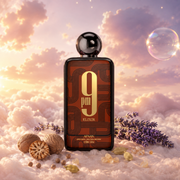 The bottle of 9 PM Elixir by Afnan surrounded by nutmeg, elemi, allspice and lavandin, on clouds.