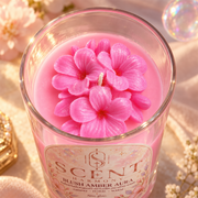 Close-up of the wax flower on the Blush Amber Aura candle