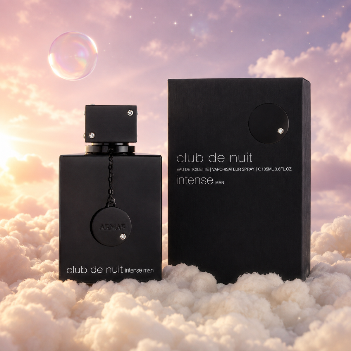 El frasco de Club de Nuit Intense Man de Armaf junto a su caja original, sobre nubes.