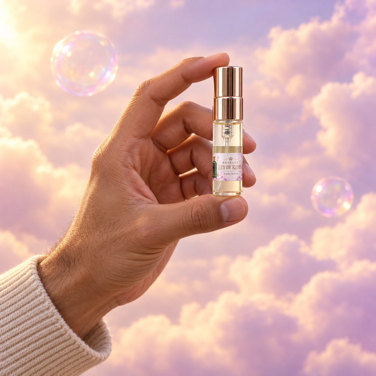 A 5 ml vial of Rey de Reyes in hand, to show its real size