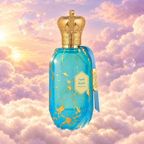 Frasco de Eter Arabian Sky de Armaf sobre un banco de nubes, en un cielo rosa y lavanda con pompas iridiscentes y luz dorada.