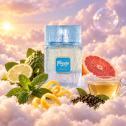 The bottle of Freeze by Riiffs surrounded by spearmint, lemon zest, tea and ginger, on clouds.