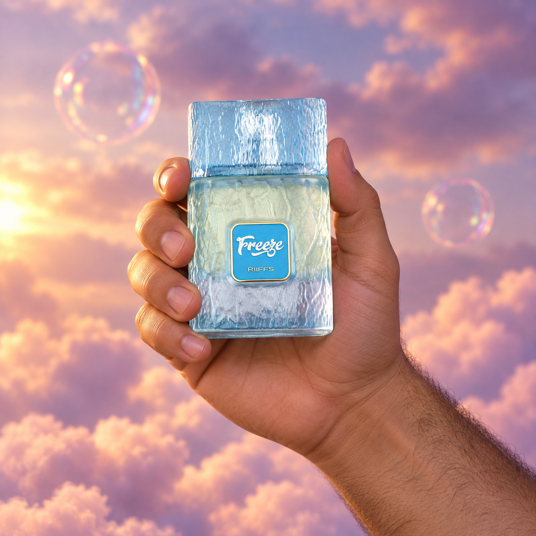 A hand holds the bottle of Freeze by Riiffs among pink clouds.
