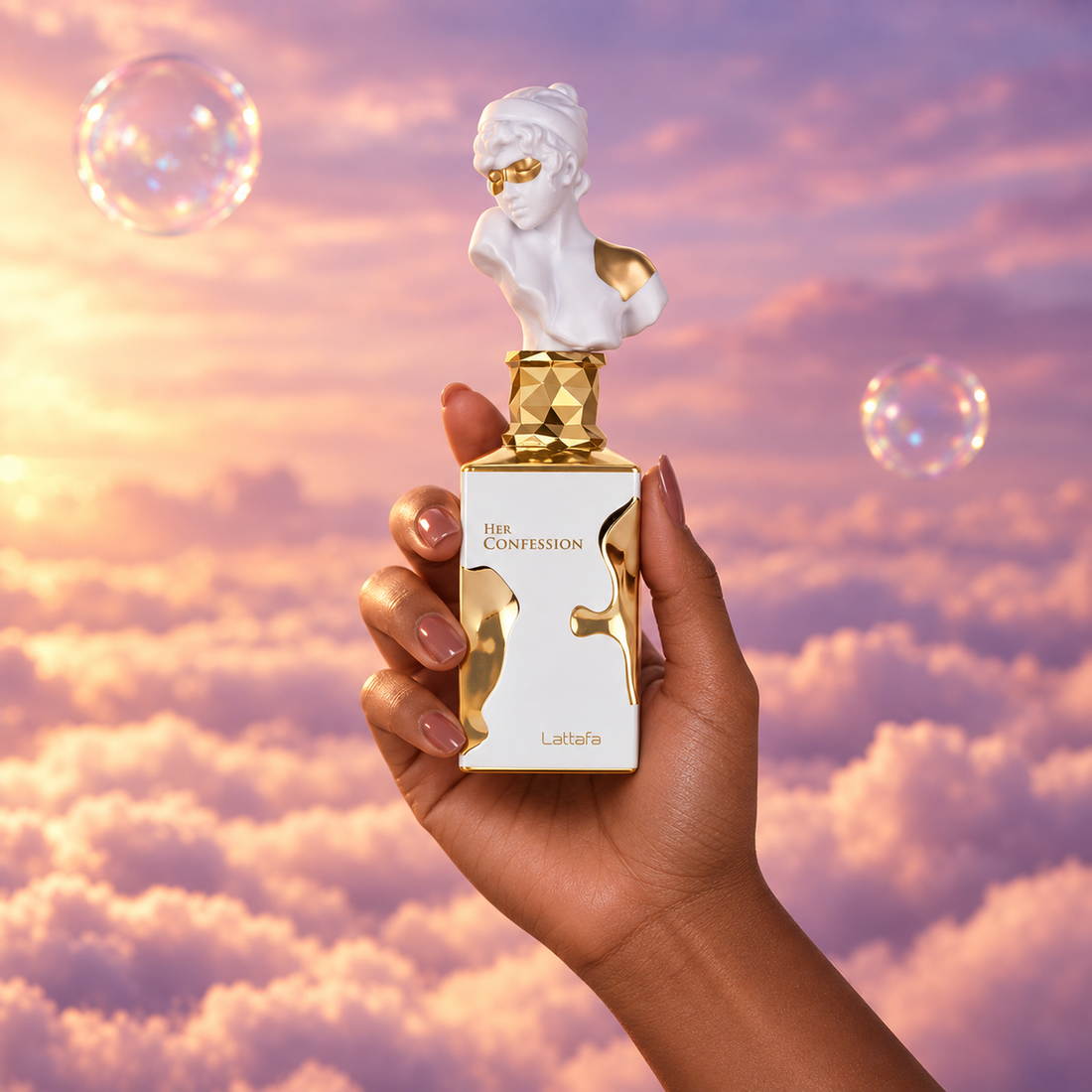 A hand holds the bottle of Her Confession by Lattafa among pink clouds.