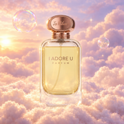 Bottle of I Adore U by Jo Milano on a bank of clouds, in a pink and lavender sky with iridescent bubbles and golden light.