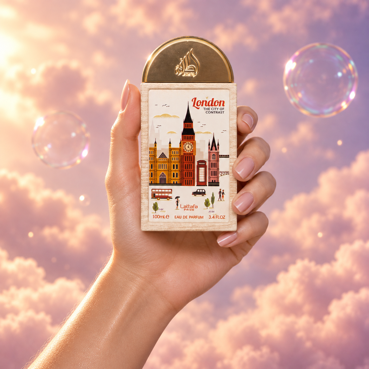 A hand holds the bottle of London The City of Contrast by Lattafa among pink clouds.