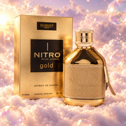 El frasco de Nitro Gold de Dumont junto a su caja original, sobre nubes.