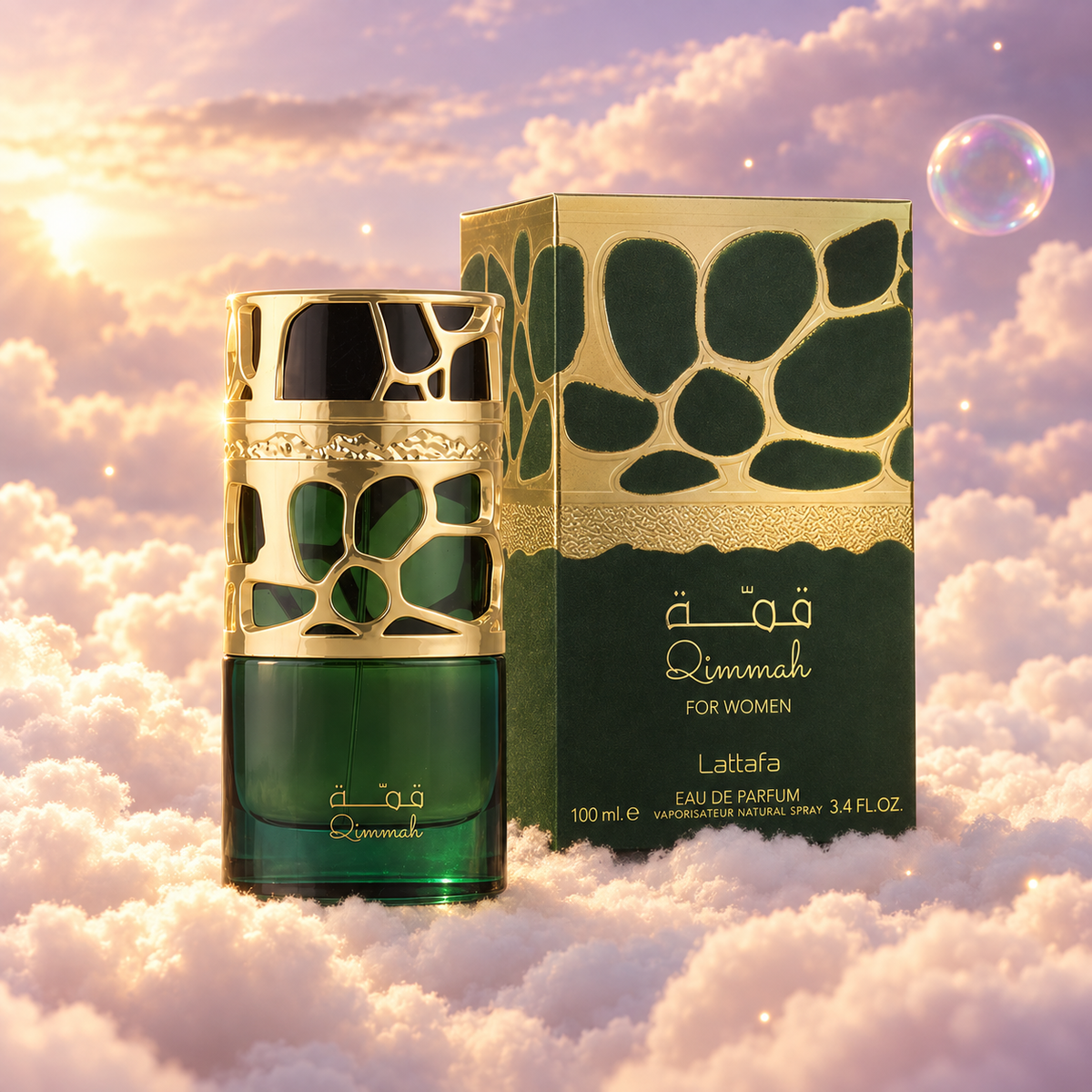 The bottle of Qimmah by Lattafa next to its original box, on clouds.