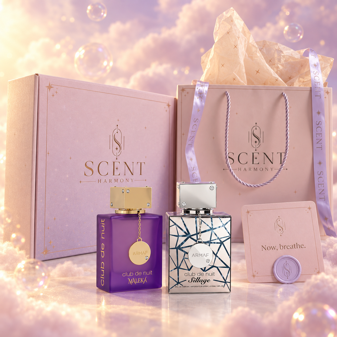 Kit de regalo Queen's Trail para parejas delante de la caja y la bolsa de regalo de Scent Harmony