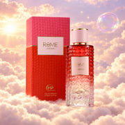 The bottle of Rome La Bomba by Bharara next to its original box, on clouds.