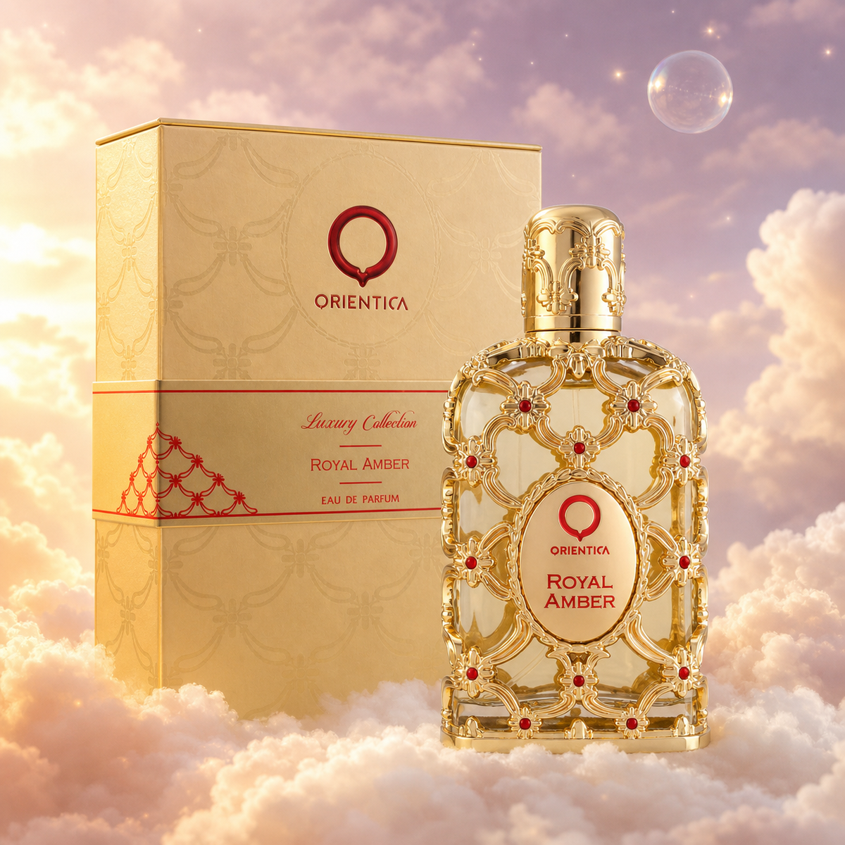 The bottle of Royal Amber by Orientica next to its original box, on clouds.