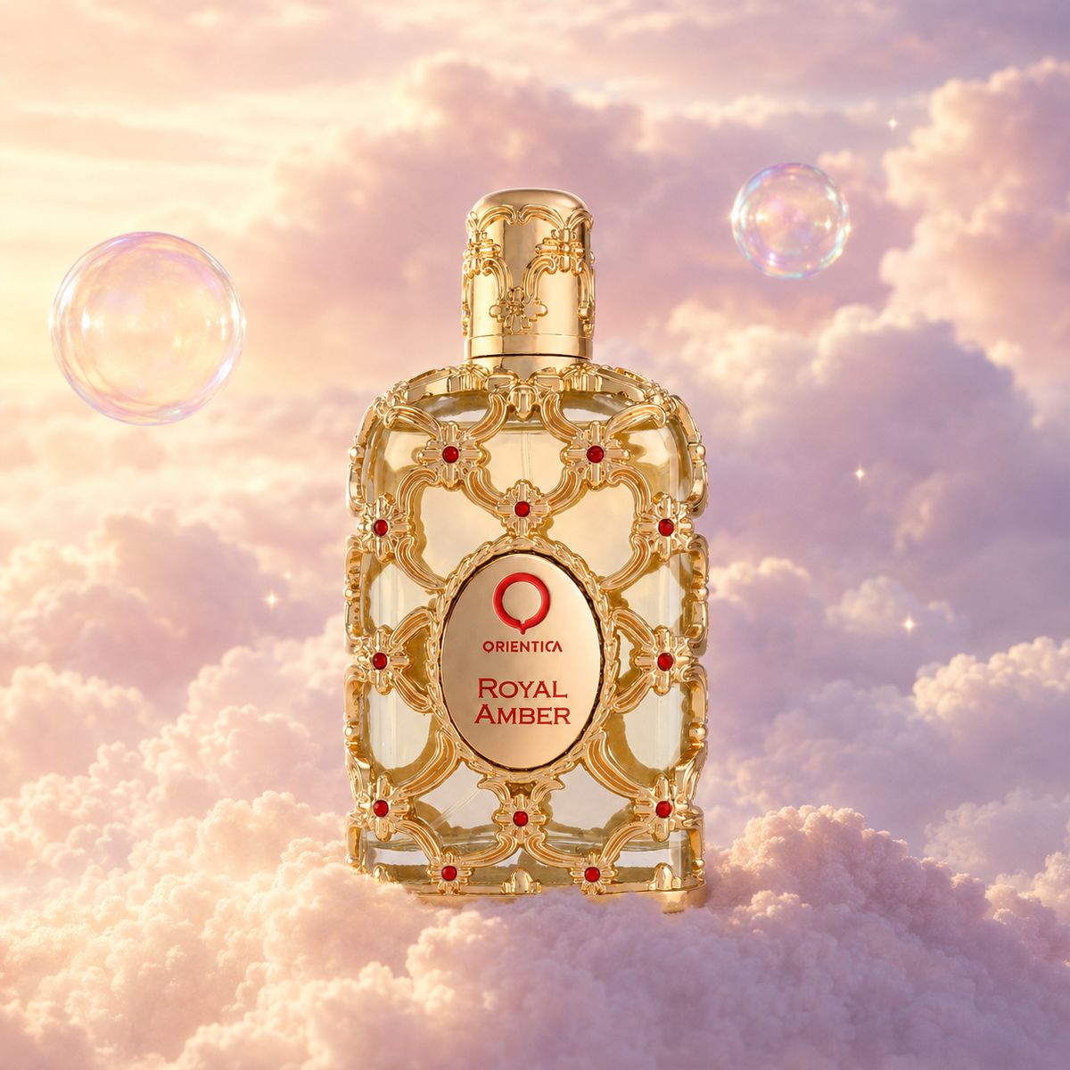 Bottle of Royal Amber by Orientica on a bank of clouds, in a pink and lavender sky with iridescent bubbles and golden light.