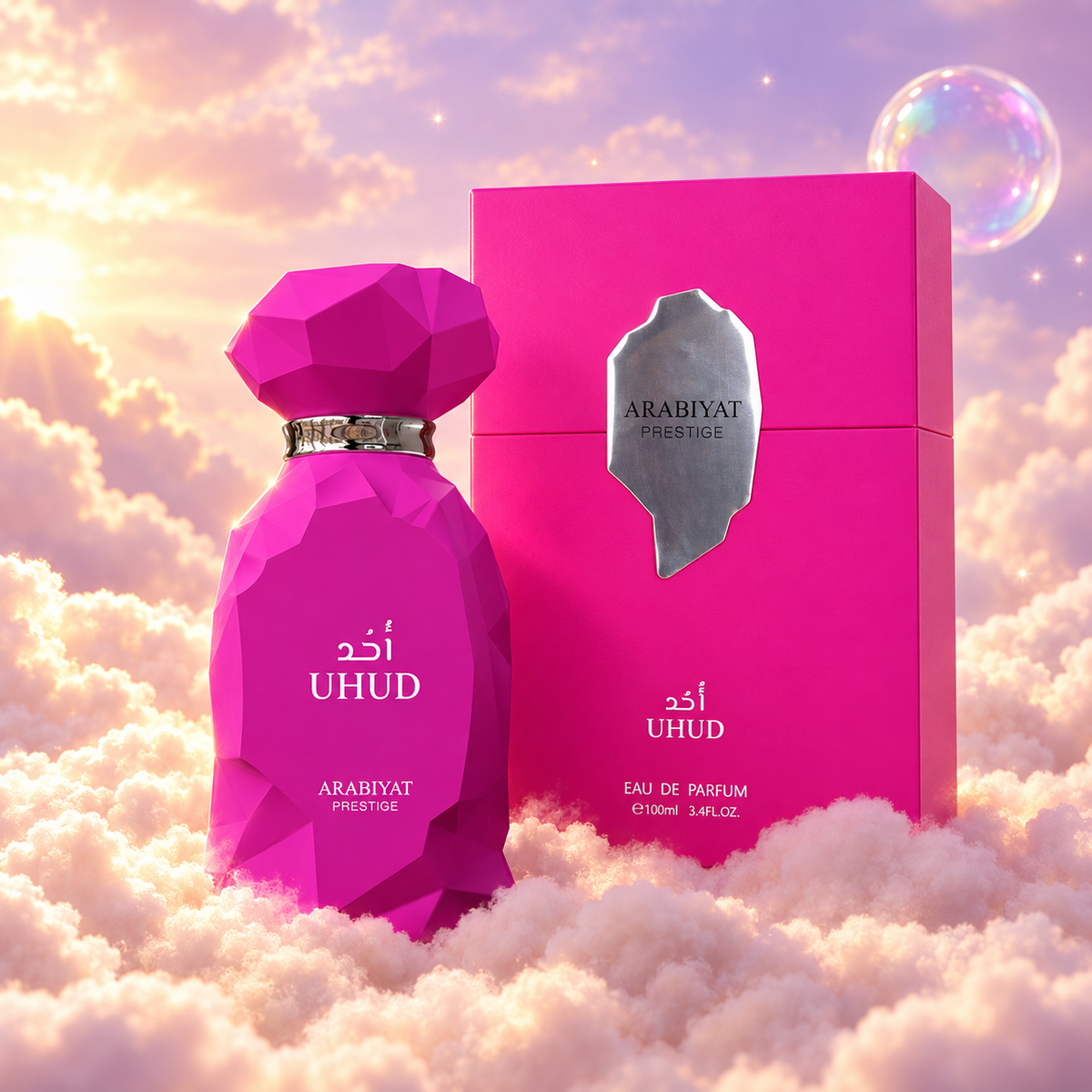 The bottle of Uhud by Arabiyat Prestige next to its original box, on clouds.